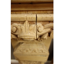  19th century pine fire side uprights fireplace pilasters, mask Corinthian column capital, scrolled decoration, fluted, acanthus leave carved with stepped ogee plinth, H89cm  