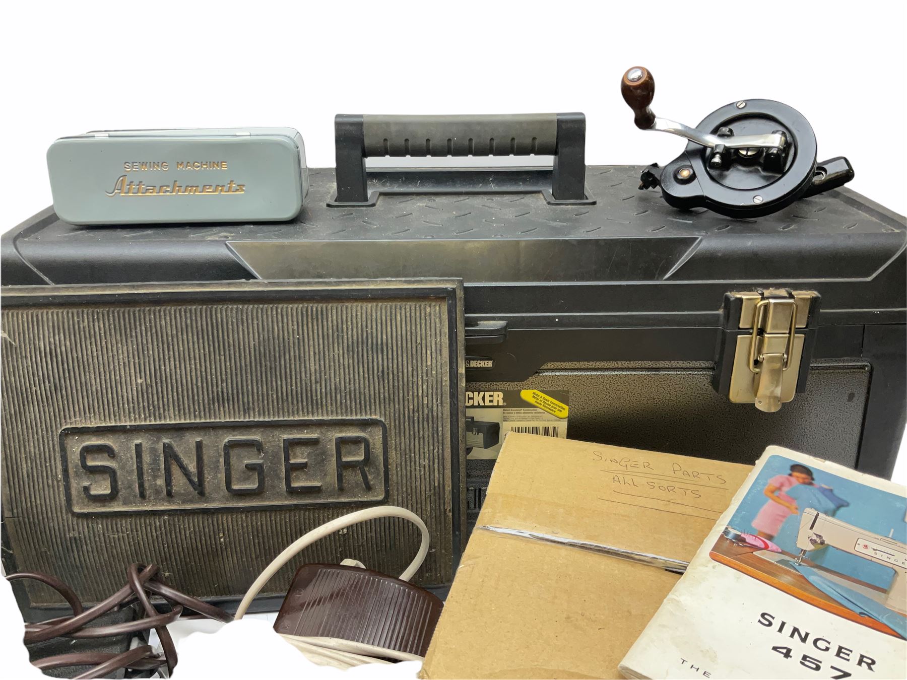 Two Singer sewing machines, model numbers 527 and 457, together with