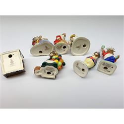 A group of seven Royal Doulton Bunnykins figures, comprising Father, Mother & Victorian Bunnykins DB68, Santa Bunnykins DB17, Uncle Sam Bunnykins DB50, Bunnykins Sleepytime DB15, Old Baloon Seller Bunnykins DB217, Statue of Liberty Bunnykins DB198, and Ice Cream Bunnykins DB82.