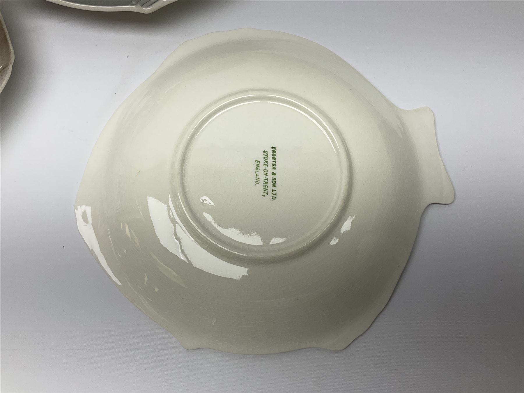 Shorter & Son six fish plates, together with a larger platter and sauce boat and saucer, all with stamped marks beneath