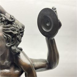 After the Antique, early 20th century bronze figure group, modelled as Pan holding cymbals, with infant Bacchus upon shoulders, stood beside a tree stump with fruiting vines, pan flute and clock, upon rectangular plinth, overall H70cm
