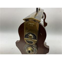 Late 20th century mahogany and silver plated two cut glass decanter tantalus, marked PB&S, with Whisky and Gin Crown Staffordshire ceramic decanter labels, H32cm