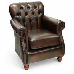 Thomas Lloyd - brown leather armchair, the button upholstered back over padded arms with s...