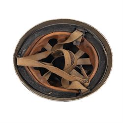 WWII British parachute regiment helmet, marked BMB and dated 1944 to the leather liner, size 7 3/4, complete with liner, the canvas strap with leather chinpiece