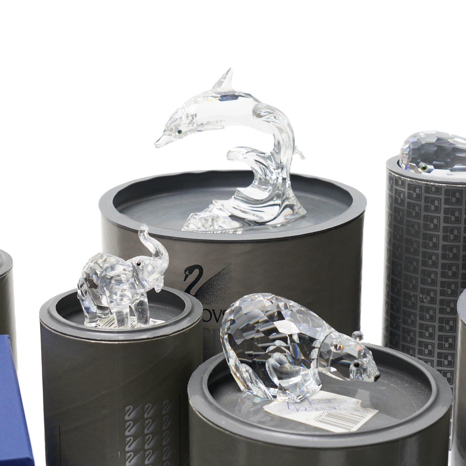 Large collection of Swarovski animal figures, comprising Koala, Polar Bear, Jaguar, mother and baby Seals, two Hedghogs, two Chicks, Fox, Elephant, Dolphin, Turtles, Whale, Rhino and others, all boxed (21)
