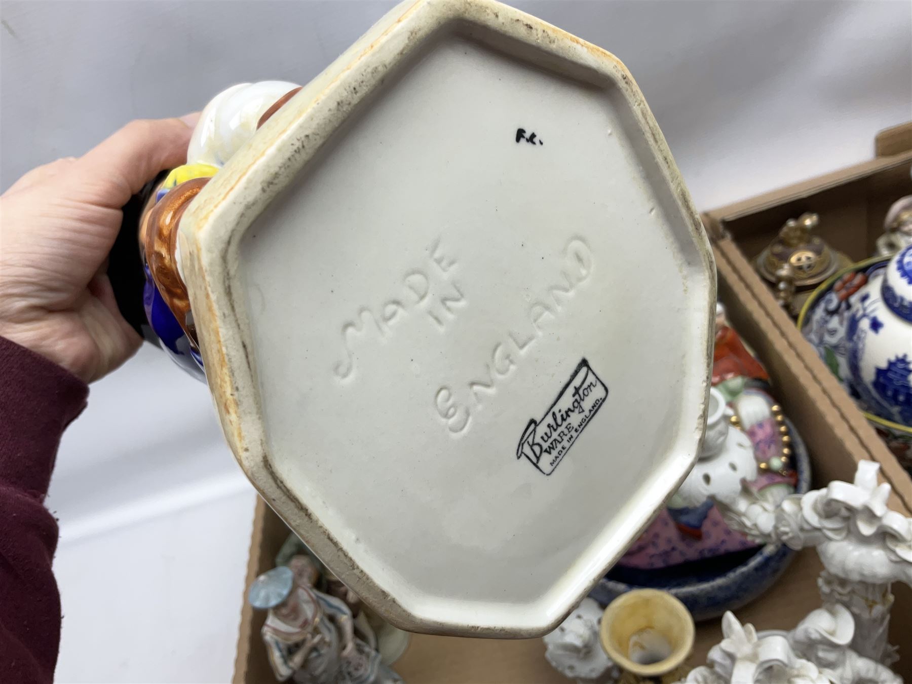 Collection of ceramics to include Royal Doulton Winston Churchill toby jug, Capodimonte style figures, novelty brandy decanter etc, in two boxes