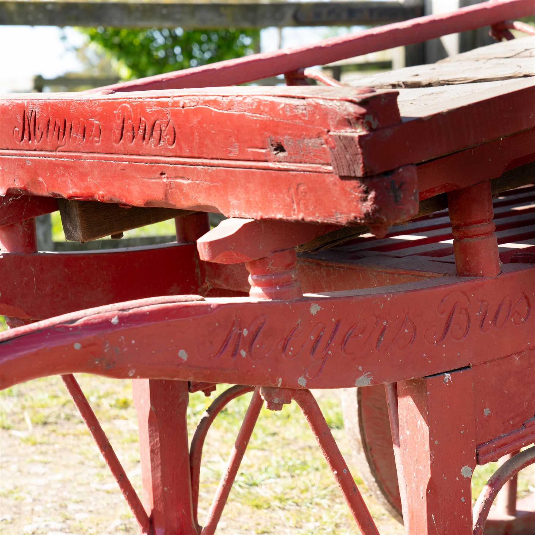 Costermonger’s Cart

A painted costermonger’s cart with red timber frame, slatted deck and wooden spoked wheels. The cart has long hand rails, raised side rails and turned supports, with incised inscriptions to the frame, including “Meyers Bros”. The form is consistent with a hand drawn market cart, used for carrying and displaying produce or goods.

Features:
Red painted timber frame
Slatted wooden deck
Wooden spoked wheels
Long hand rails
Raised side rails
Turned timber supports
Incised inscriptions to the frame
“Meyers Bros” inscription visible
Traditional market cart form

Dimensions:
Length: 240 cm (body approximately 210 cm)
Width: 102 cm
Height: 92 cm

Wheel diameter: 67 cm