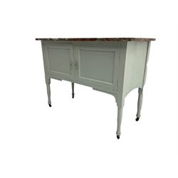 Late Victorian painted wash stand with red marble top, enclosed by two panelled doors, on turned supports with castors