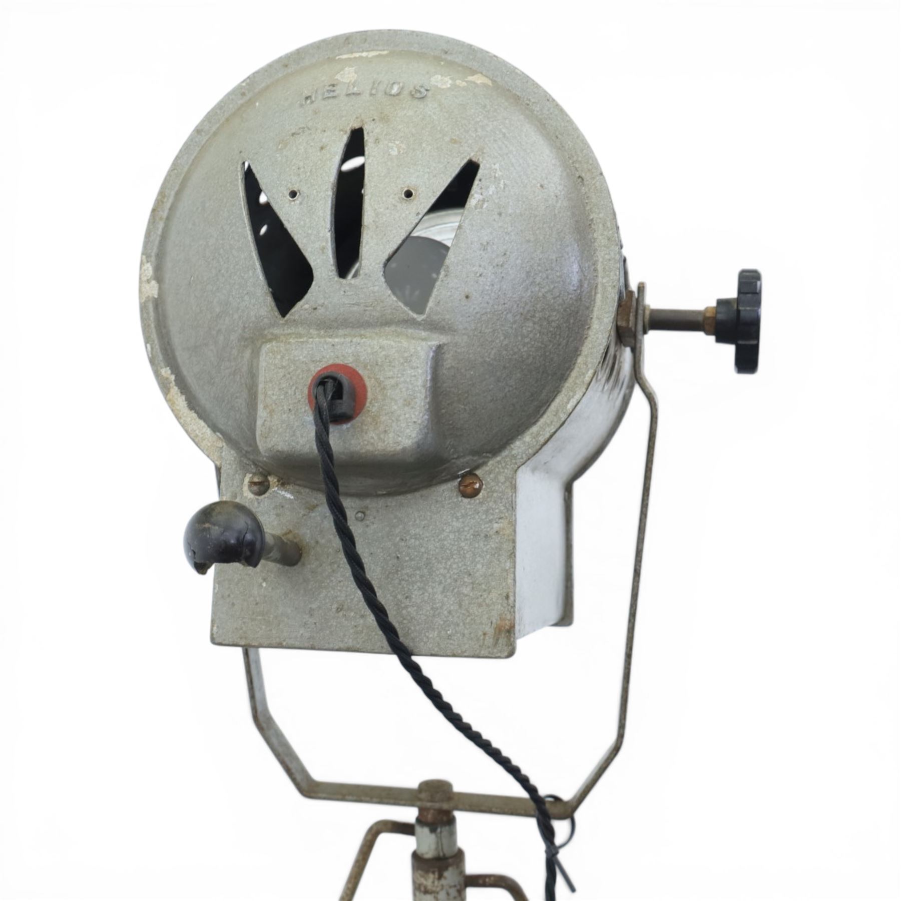 Helios London Ltd - The 'Cute' spotlight lamp, adjustable spotlight head, raised on a metal base with tripod feet