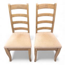 Barker and Stonehouse Flag Stone extending dining table and four matching chairs, the rectangular top with parquetry inlay and contrasting border, extending by central leaf, on slightly curved supports, the chairs with padded upholstered seats and ladder backs (Chairs H 108cm, W 50cm, D 54cm) (Extends to 195cm)