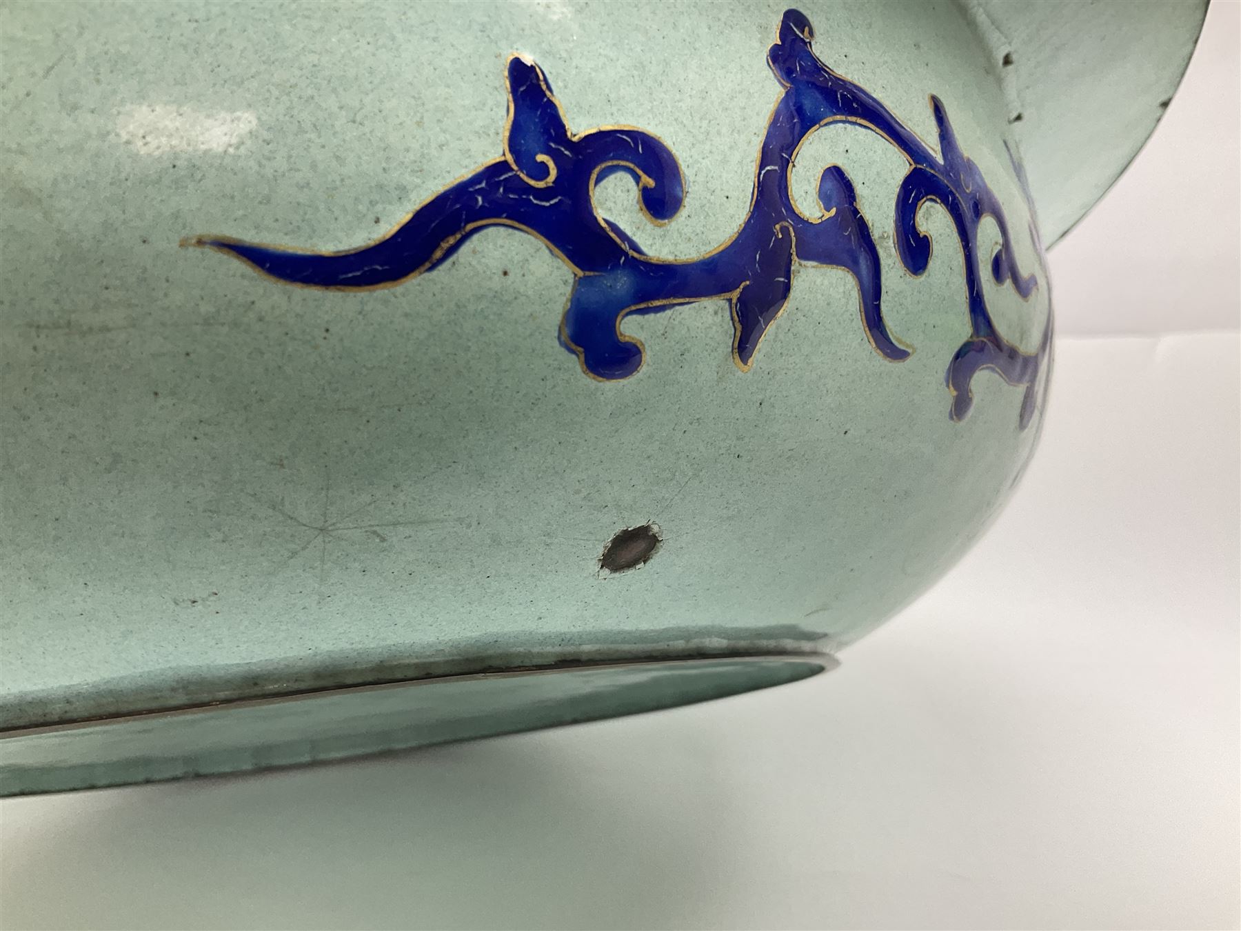 18th/19th century Chinese Canton enamel basin, the circular basin with flat everted rim, decorated with scrolling foliate and fruit decoration on a blue ground, D43cm