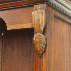 Late 20th century Georgian design hardwood open bookcase, moulded cornice above a shaped frieze, open shelved interior with boarded back, the base fitted with two short drawers with brass swan neck handles, on a shaped plinth