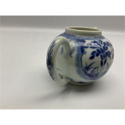 Two late 18th/early 19th century Chinese export teapots, the largest example of globular form with curved handle and straight spout, decorated in the Mandarin style with figural scenes surrounded by red scale reserves, H13.5cm, the second smaller example decorated in underglaze blue with two musicians in a landscape set with willow tree and fence, H10.5cm

