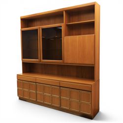 McIntosh Furniture - mid-20th century teak highboard unit, two glazed cupboards enclosing a glass shelved interior, a fall front cabinet to the other side mirrored back, with three frieze drawers one fitted for cutlery, with applied square panels