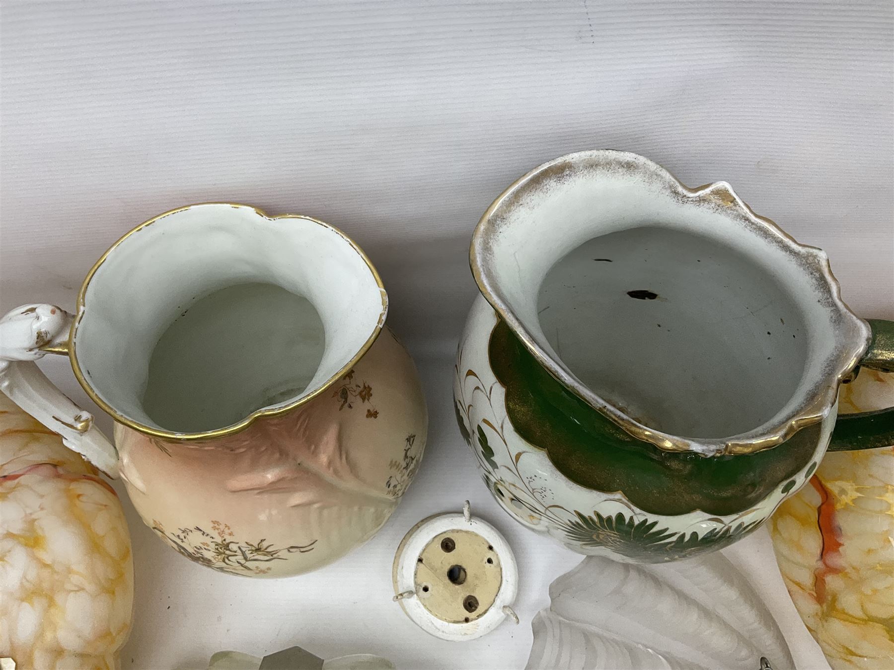 Two Art Deco mottled glass fly catcher ceiling light shades, together with two other 1930s moulded glass ceiling light shades and two Victorian style wash jugs, largest shade D33cm