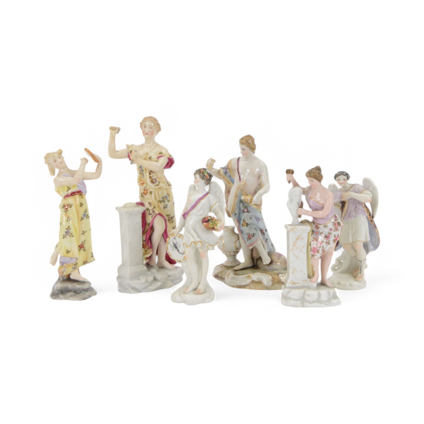 Six continental classical figures, including two French examples Janvier and Jun depicting winged figures holding a painted zodiac sign, with spurious marks beneath, tallest H17cm