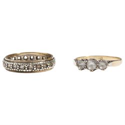 Gold white spinel full eternity ring and a three stone white spinel ring, both 9ct