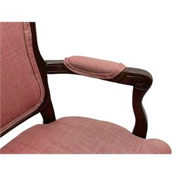 French style stained beech two seat settee, the cresting rails carved with flower heads, mould arms with scrolled terminals, upholstered in pink herringbone fabric, floral carved cabriole supports