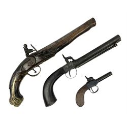 Percussion action single barrel pocket pistol with 5.5cm barrel and walnut stock L16cm overall; another percussion action pistol with captive swivel ramrod under the 16cm barrel; and a Spanish copy of an ornamental flintlock holster pistol (3)