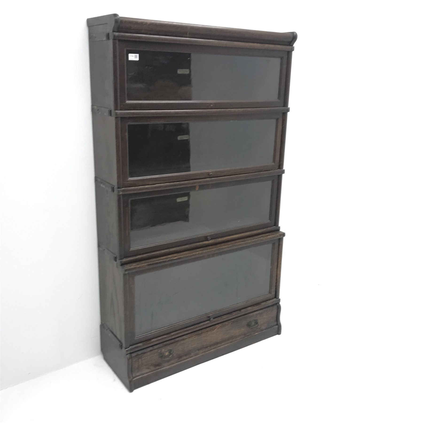 Early 20th century Globe Wernicke oak four tier sectional library bookcase, single drawer, W87cm, H150cm, D332cm