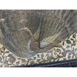 Framed silk embroidered panel decorated with a peacock design in silver and gilt wire embroidery, within a carved ebonised frame, H58cm, W51cm 