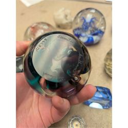 Collection of glass paperweights, including Caithness and Selkirk Glass