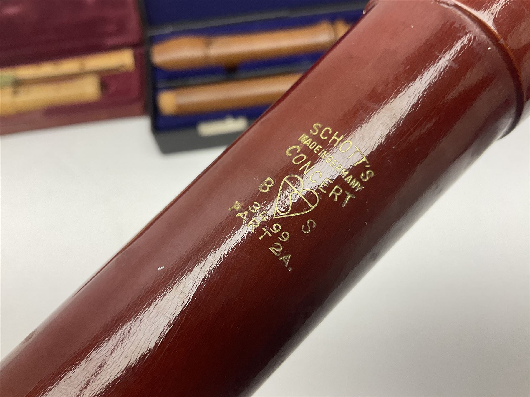 Three wooden recorders - 1970s Schotts 'Concert' three-piece tenor; 1990s Dolmetsch treble, cased; and 1980s Moech descant, cased (3)