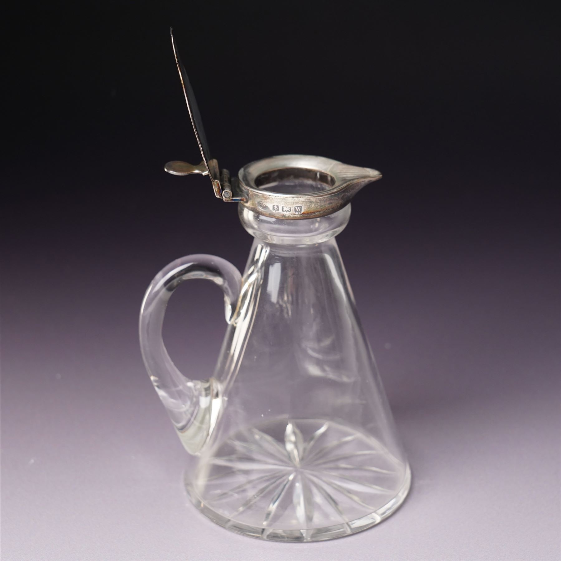 Glass whisky noggin with silver hinged cover and clear glass handle H10cm Birmingham 1921 Maker Hukin & Heath, a pair of early silver decanter labels 'Lisbon' and 'Port' and a small silver frame 