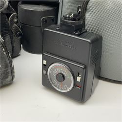 Canon AE1 camera, 'no. 4403757', fitted with Canon 'FD 50mm 1:1.8' lens, Hoya 'HMC Wide-Auto f24mm 1:2.8' lens and various other lenses and camera accessories, housed in a soft carry bag