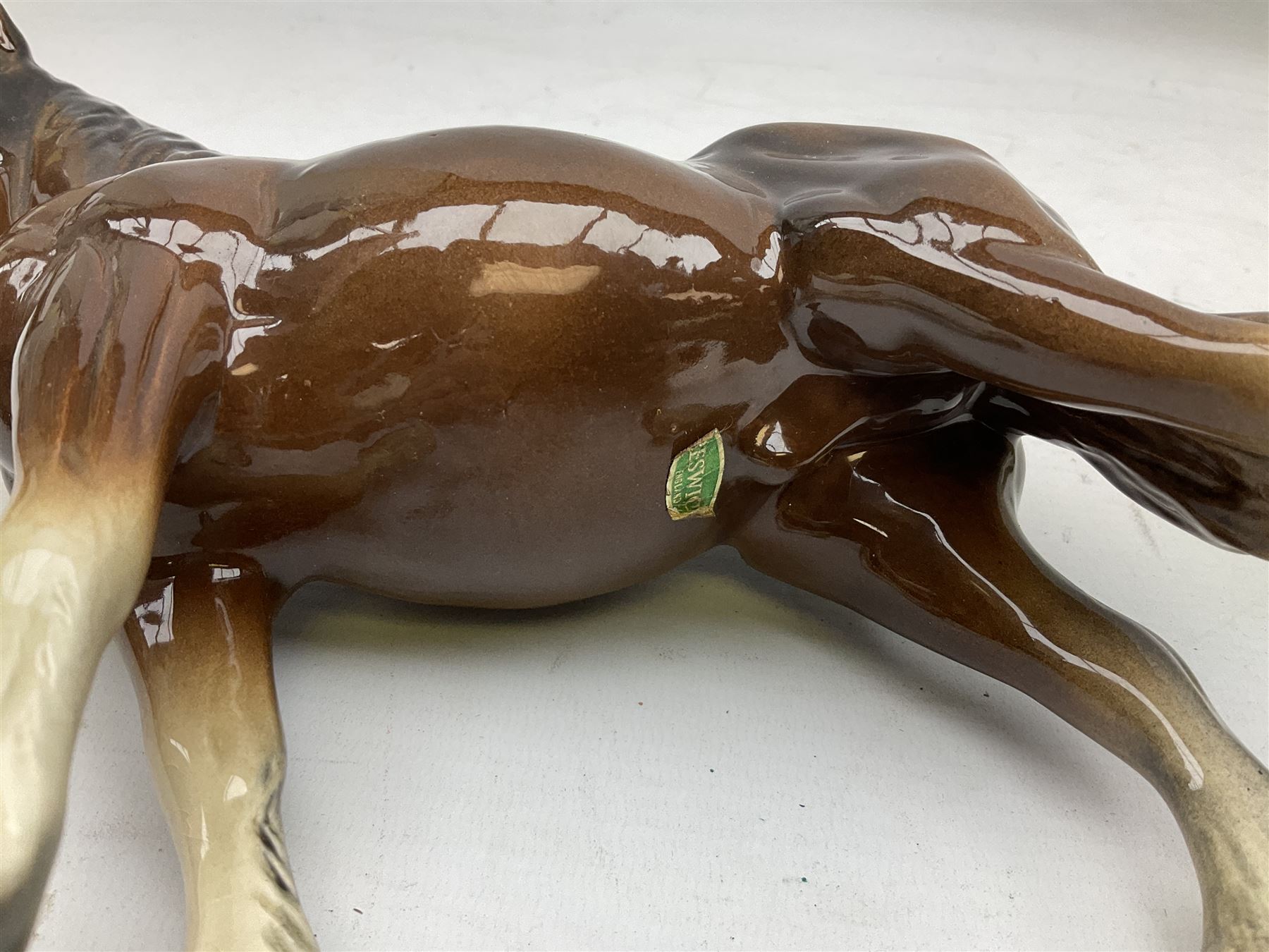 Seven Beswick figures of horses, including Connemara pony in grey no.1641, Arab in bay no.1265, large foal in grey no.947 etc, together with a Goebel figure of a horse (8)