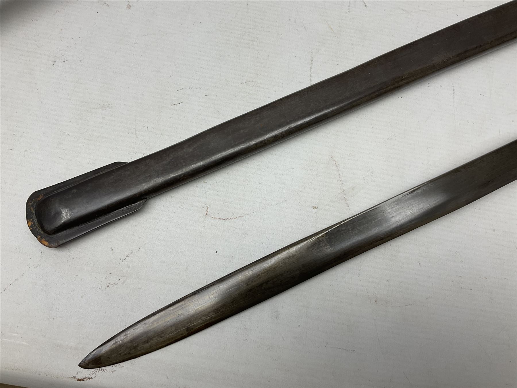 Reproduction Scottish officers basket hilt broad sword, the brass basket pierced with heart-shaped motifs lined with red lining, together with a reproduction Japanese Katana sword, longest L110cm