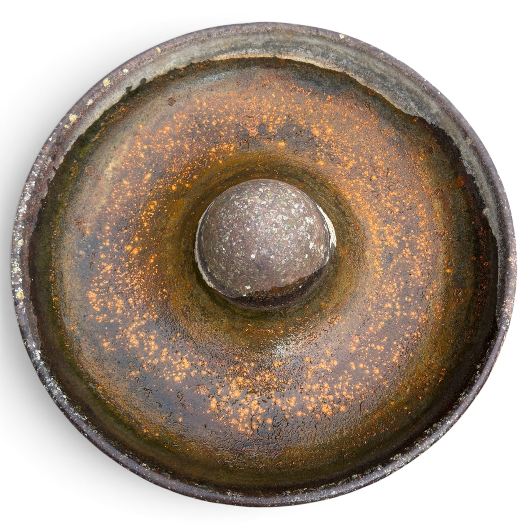 Two early 20th century cast iron ‘Mexican hat’ pig trough planters, each of circular dished form with central domed boss, one fitted with fixing studs for radial feeding divisions