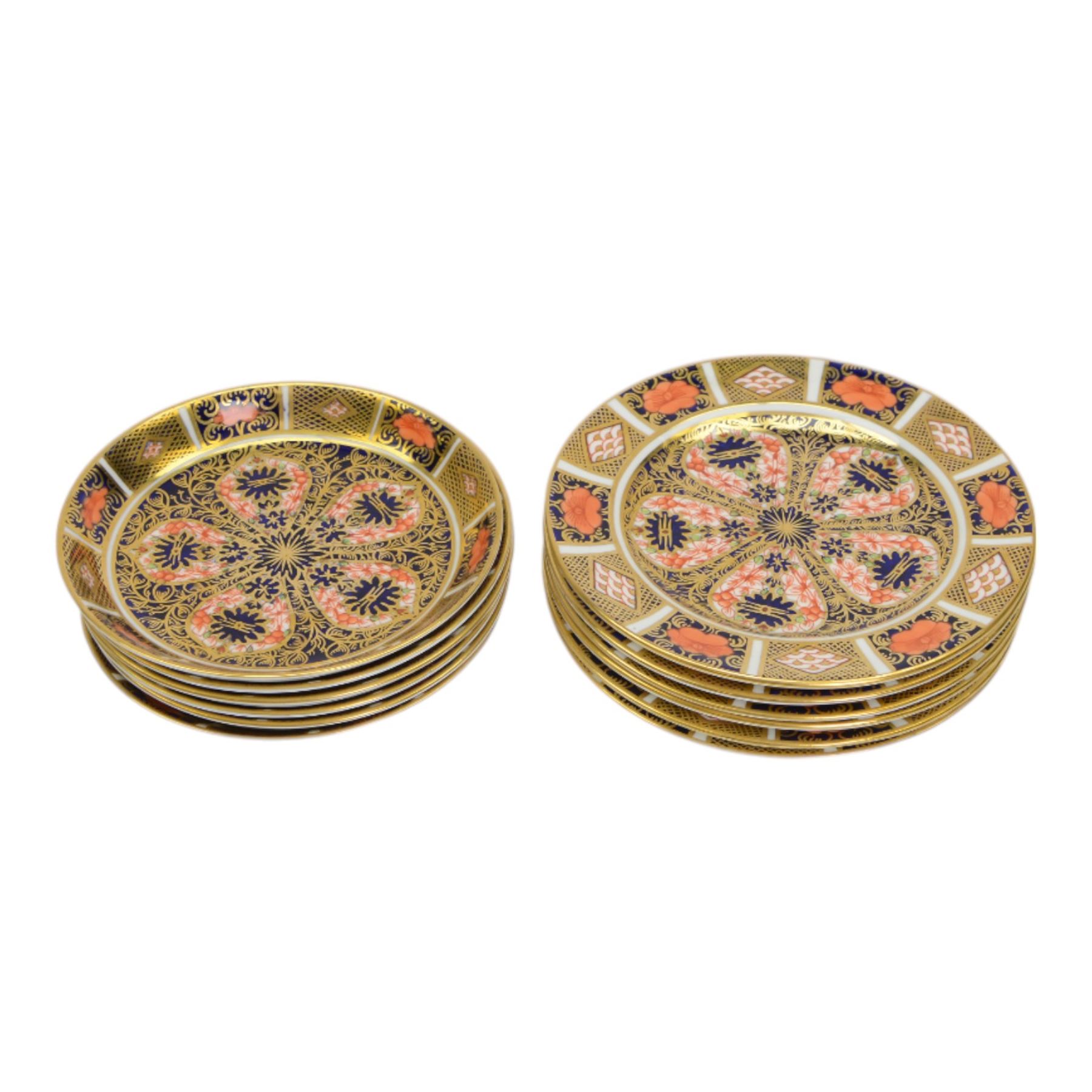 Royal Crown Derby tea service for six in Imari 1128 pattern, comprising teacups and saucers, side plates, sandwich plate, milk jug, open sucrier and cake slice 