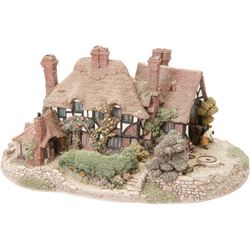Four Lilliput Lane models, comprising Oakwood Smithy, We Plough the Fields and Scatter, Bluebell Farm and Highghyll Farm