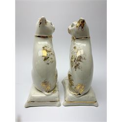 Pair of Victorian Staffordshire cats, modelled seated upon cushions, with gilt detail throughout, H18cm