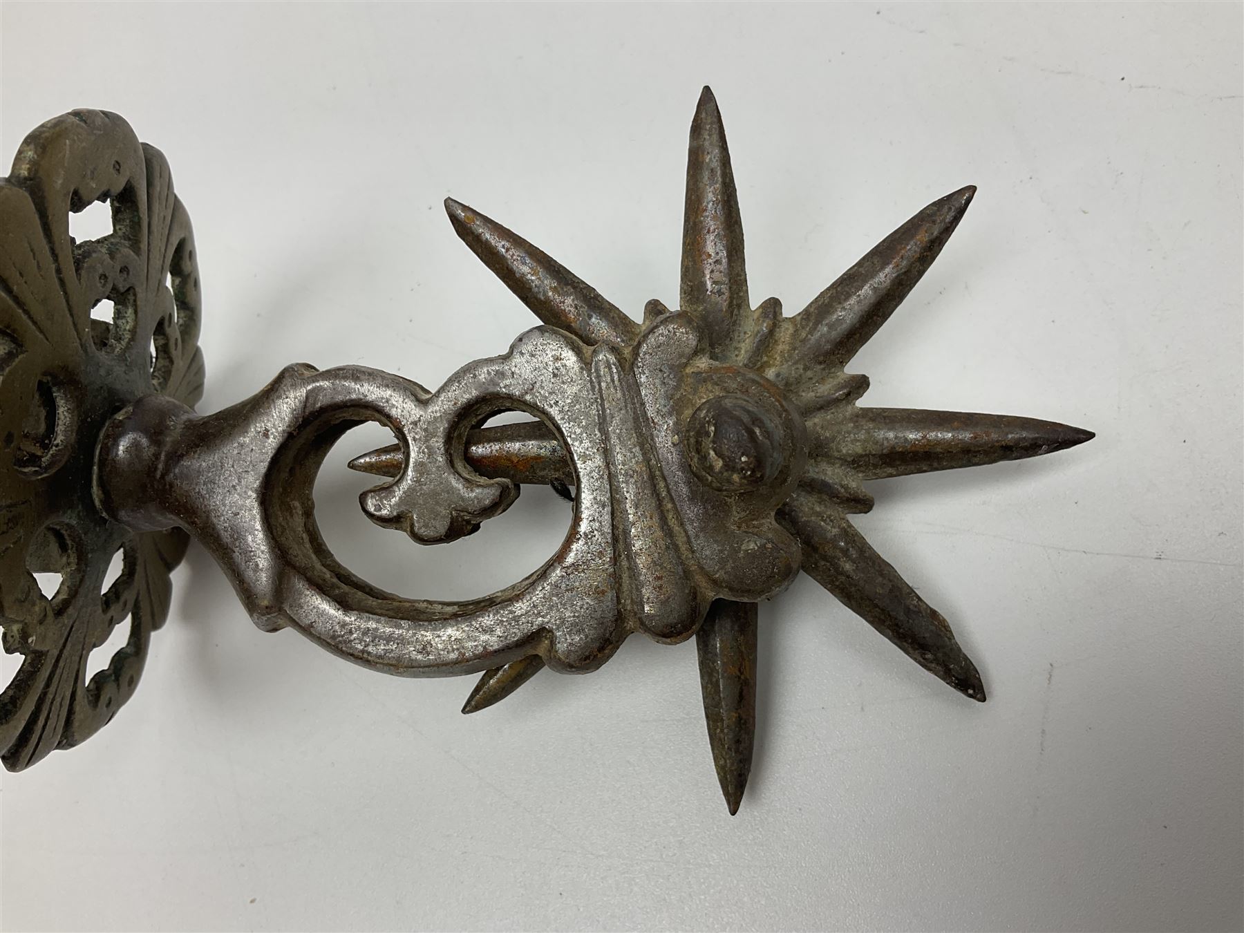 Pair of South American gaucho steel and brass spurs with eight-spike heel rowels, possibly Chilean L25cm