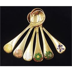 Six Danish silver-gilt year spoons by Georg Jensen, each decorated with different floral motif including Iris, Globe Flower and Waldmeister, dated between 1971 and 1982, each impressed on underside RA AB, Sterling Denmark, and marked for Georg Jensen