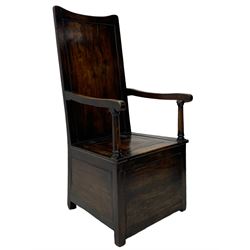18th century elm box-seat lambing chair, dished cresting rail over panelled back, panelled hinged lid flanked by two turned arm supports