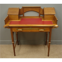  Arts & Crafts mahogany writing desk, raised shaped pierced back flanked by two hinged trinket boxes with fitted interiors, leather insert top, single drawer, tapering stile supports joined by stretchers, W100cm, H101cm, D54cm  
