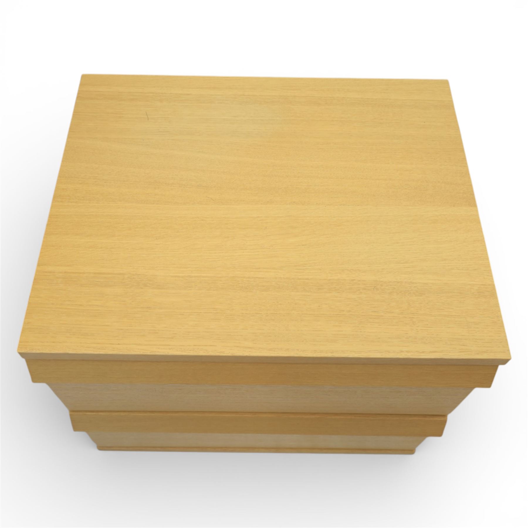 Ikea - 'Oppland' modern oak veneered chest of drawers and a pair of matching bedside chests, with moulded handles across the full width of the drawer, raised on block feet, Bedside tables (H 57cm, D 50cm, W 60cm) 