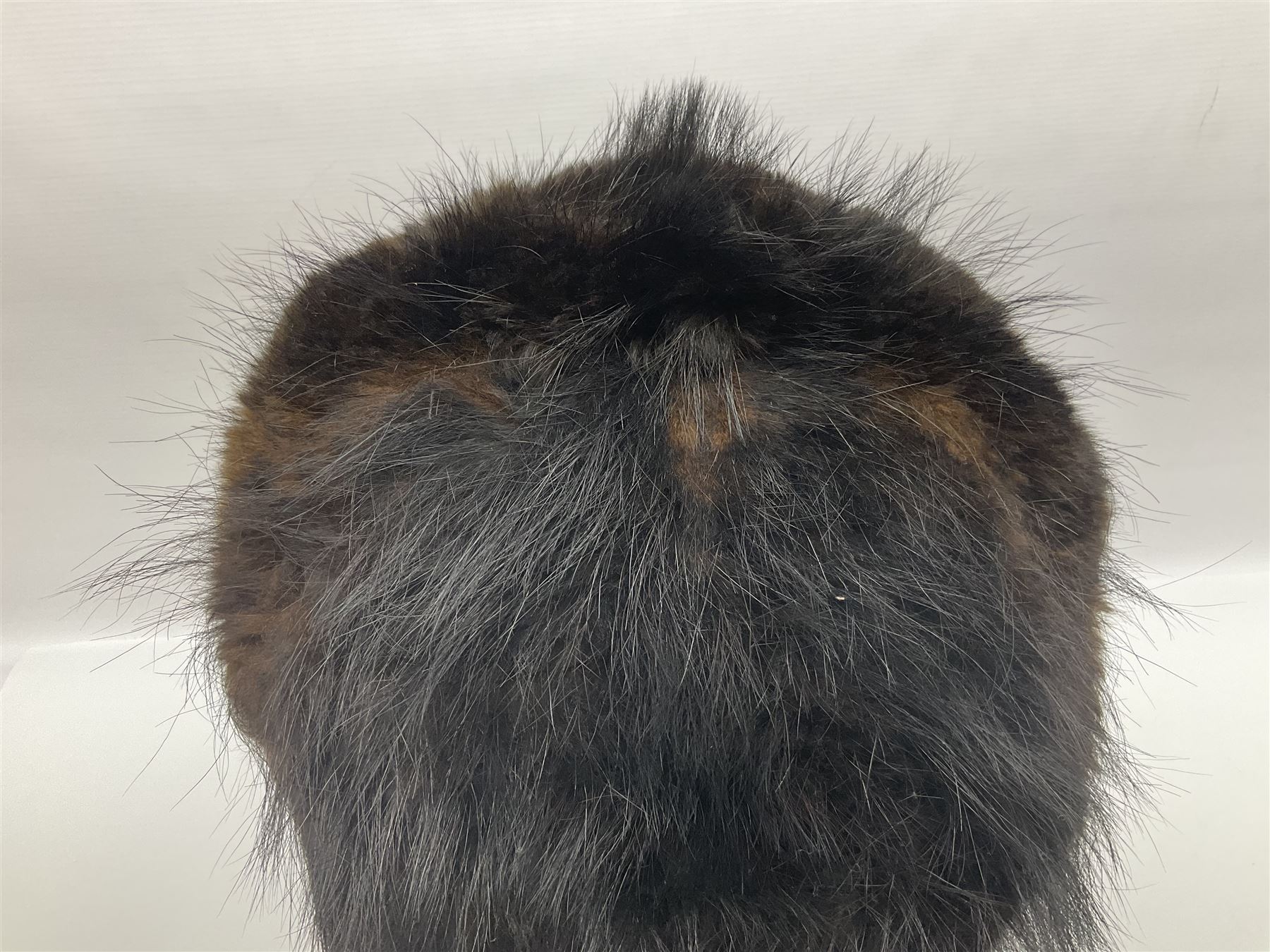 French Grenadier's bearskin hat, the embossed brass plate with crowned eagle, flaming grenades and arrow flashes; leather headband and traces of manuscript label internally