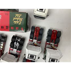 Eddie Stobart - three Oxford Die-Cast Super Rugby League lorries in perspex display cases including the two Hull Clubs; two Lledo Vanguard vans; two Days Gone vans; and Saico Truck & Trailer; all boxed; together with fourteen unboxed Corgi and other tractor/cab units etc (23)