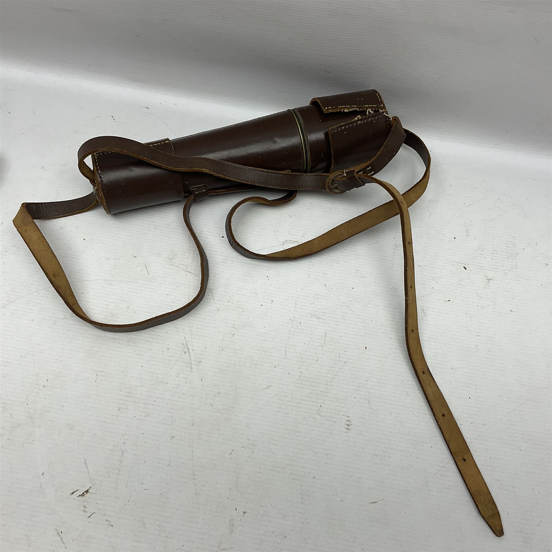 Broadhurst Clarkson brass and leather 4-draw telescope, the first draw with graduations, sliding lens shroud and leather covers for both ends on shoulder strap; marked 'Broadhurst Clarkson & Co. Ltd. 63 Farringdon Road London E.C.', L87cm fully extended; together with a WWI brass marching compass marked F-L No.123113 1918 (broad arrow); crudely etched L.H. McD. Latham; in associated Brooks & Co. leather case dated 1913 stamped W.B. Constable (2)