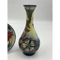 Moorcroft vase, of bottle form, decorated in the Sweet Briar pattern by Rachel Bishop, dated 1997, H7cm, together with a Moorcroft pin dish decorated in the Anna Lily pattern, D12cm (2)