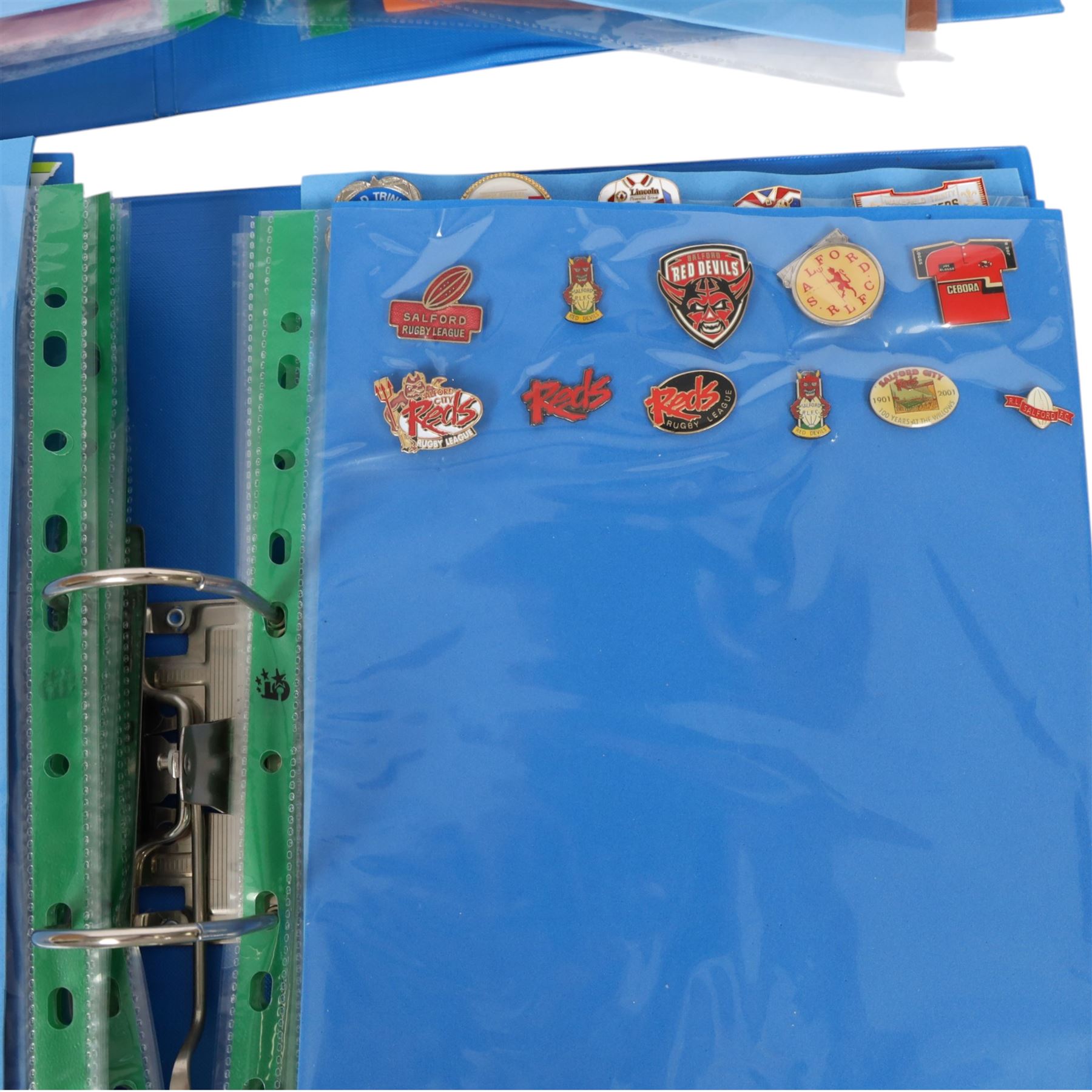 Rugby League club enamel badge collection, from teams including Bradford, Castleford, Huddersfield, Hull FC, Leeds, Leigh, St Helens, Salford, Wakefield, Wigan, York, Batley, Barrow, Bramely, Dewsbury, Featherstone, Halifax, Hunslet, Keighley, Oldham, Rochdale, Sheffield, Widnes, Workington, etc, all circa 2021, housed in two folders, (approximately 250)