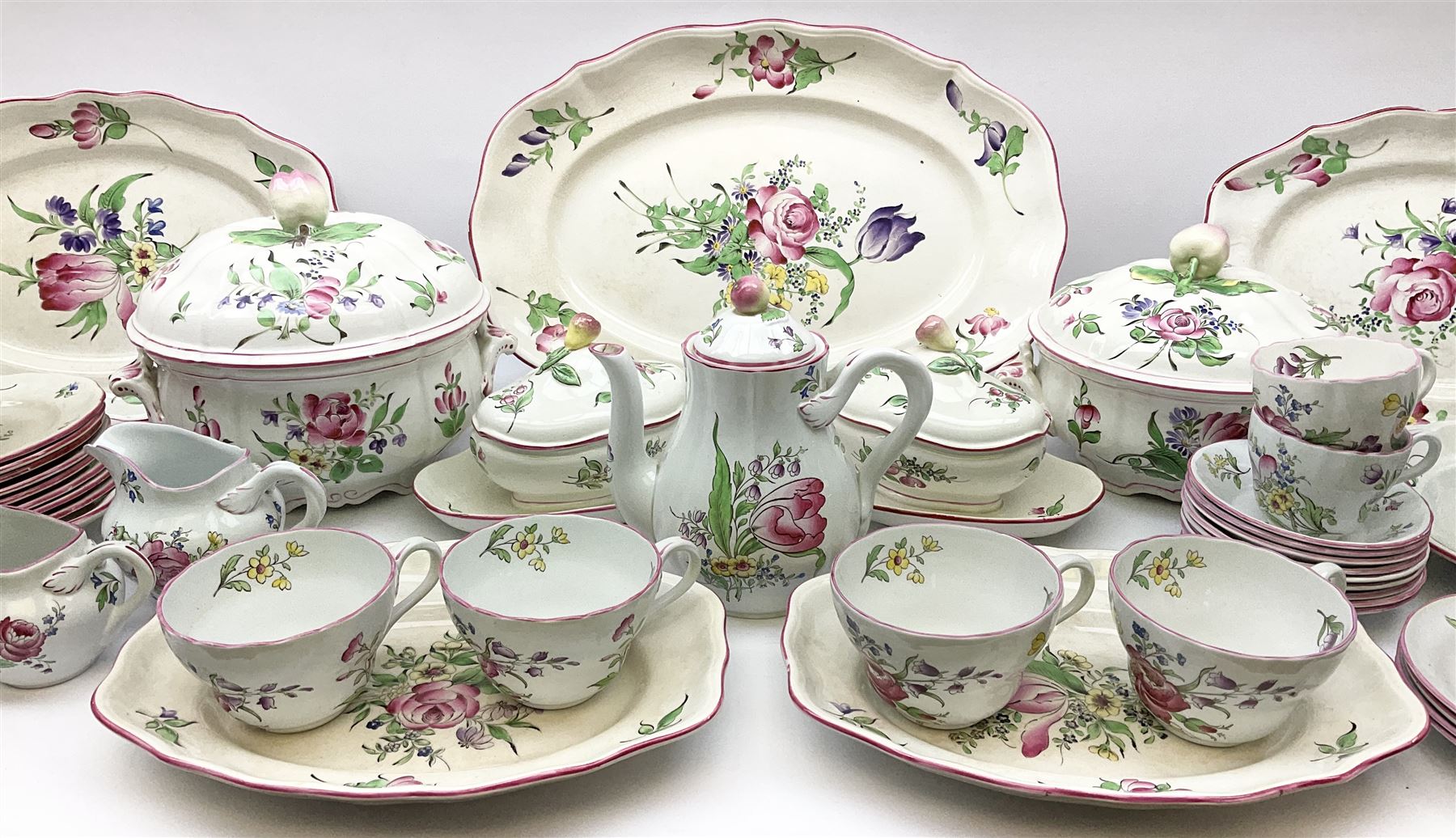 Matched Copeland Spode, Spode and French Luneville and Marlborough Sprays pattern dinner and tea wares, comprising two tureen and covers and apple finials, two sauce tureen and covers with pear finials and fixed stands, six graduated platters including two pairs, large plate, thirteen dinner plates, twelve bowls, ten smaller bowls, eight side plates, eleven smaller side plates, teapot, twin handled sucrier and cover with apple finial, open sucrier, cream jug, smaller cream jug, four breakfast cups, eight tea cups, four large saucers, eleven smaller saucers, and nine further smaller saucers. 