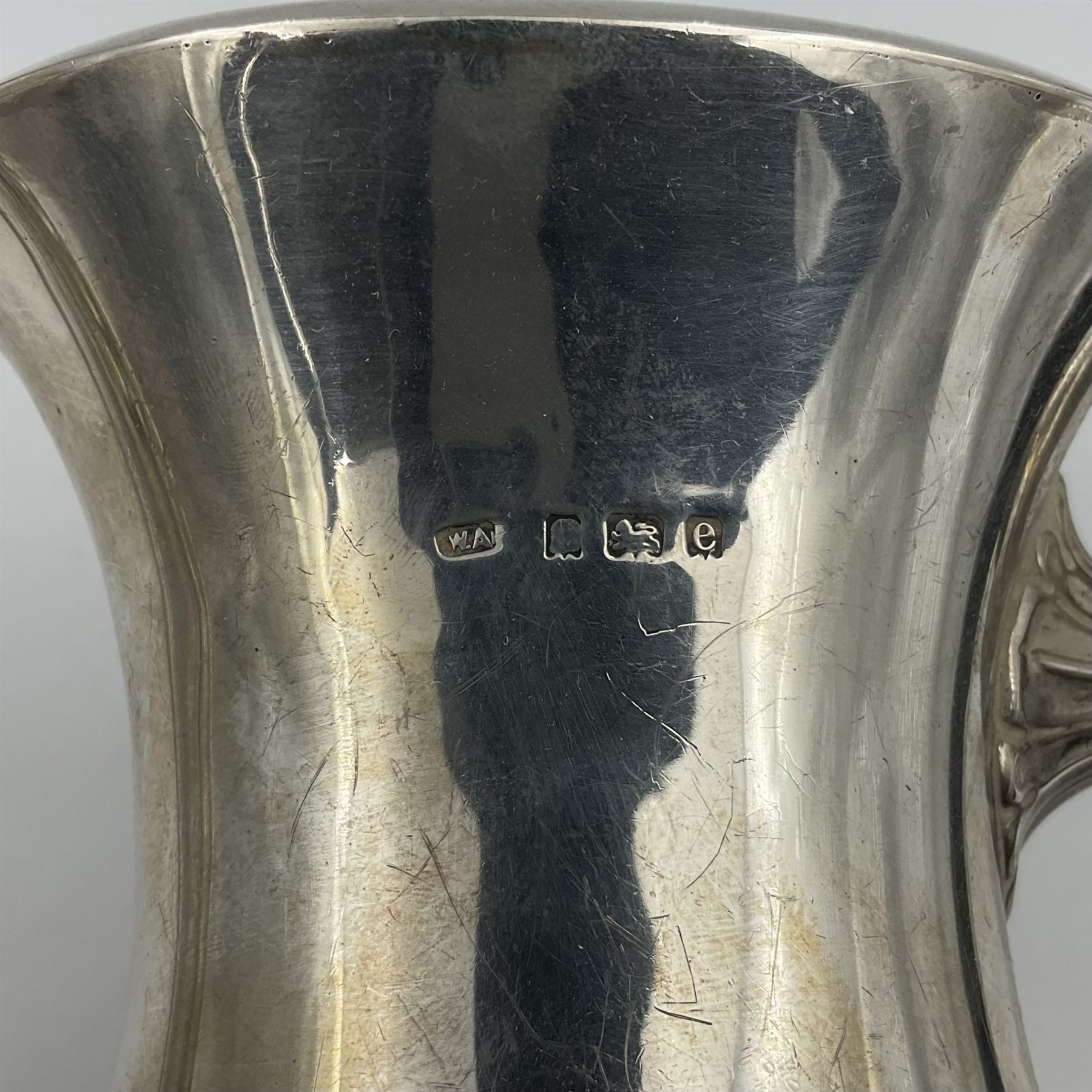 Five piece Edwardian silver tea service, comprising teapot and coffee pot, each with ebonised scroll handle, tea caddy with hinged cover, twin handled open sucrier, and milk jug, each of rounded bombe form, upon four paw feet, hallmarked William Adams Ltd, Birmingham 1904 and 1905, coffee pot H26cm
