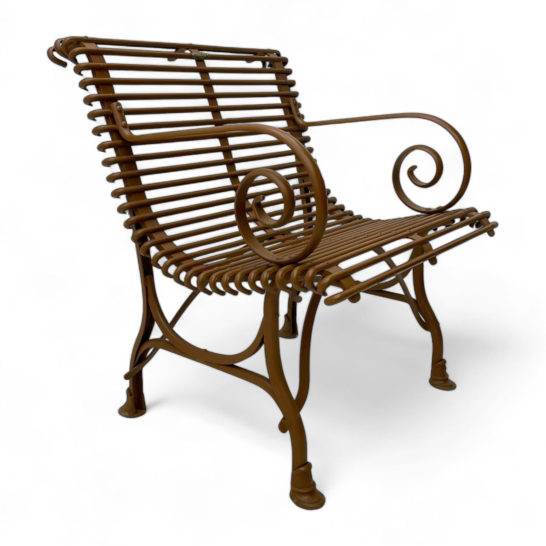 Painted wrought metal 'Arras' chair, curved frame with horizontal rails and scrolled arms, on hoof feet, in russet brown paint finish, with brass plaque 'Usine, S. Sauveur, Arras' 