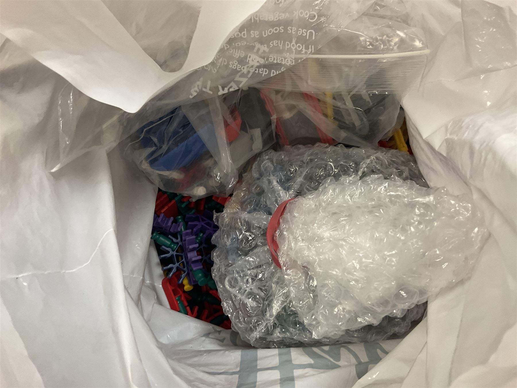 Large quantity of modern toys to include Matchbox Chopper Chase, Nikko battery control airplane, small amounts of K’nex, Meccano, playing cards to include Yu-Gi-Oh cards, keyrings etc in three boxes 