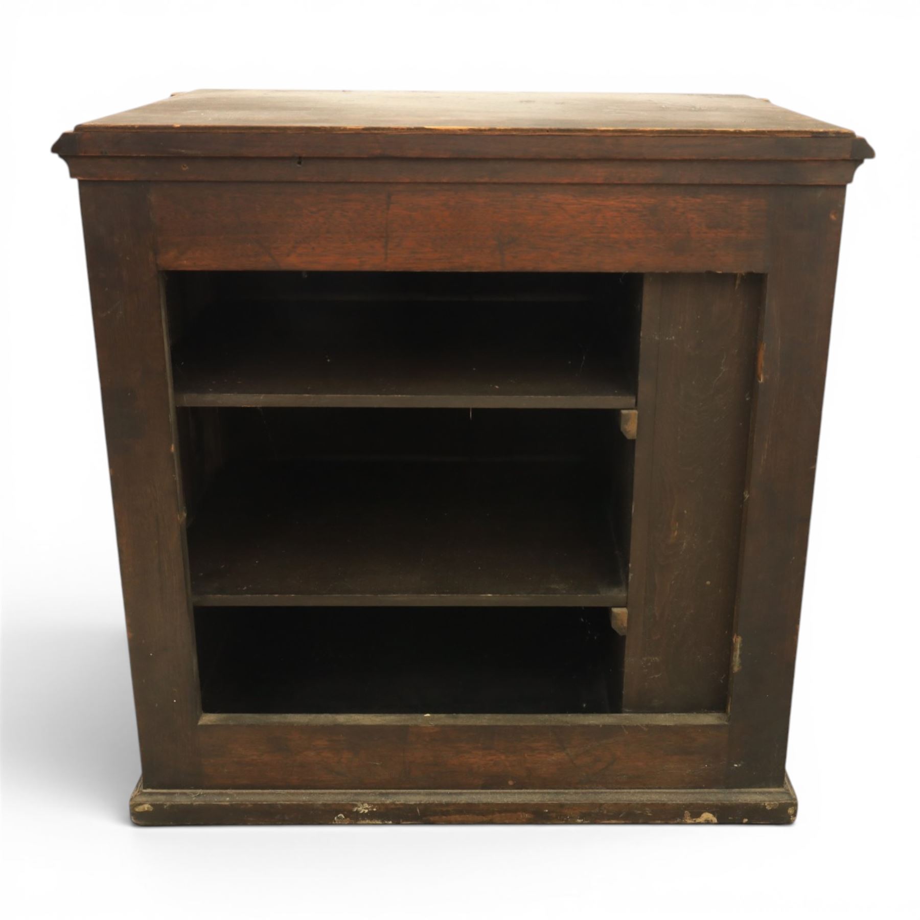 Victorian mahogany low cabinet, shaped rectangular top fitted with two arch panelled doors flanked by turned pilasters, enclosing two shelves and fitted with four short drawers with turned knobs 